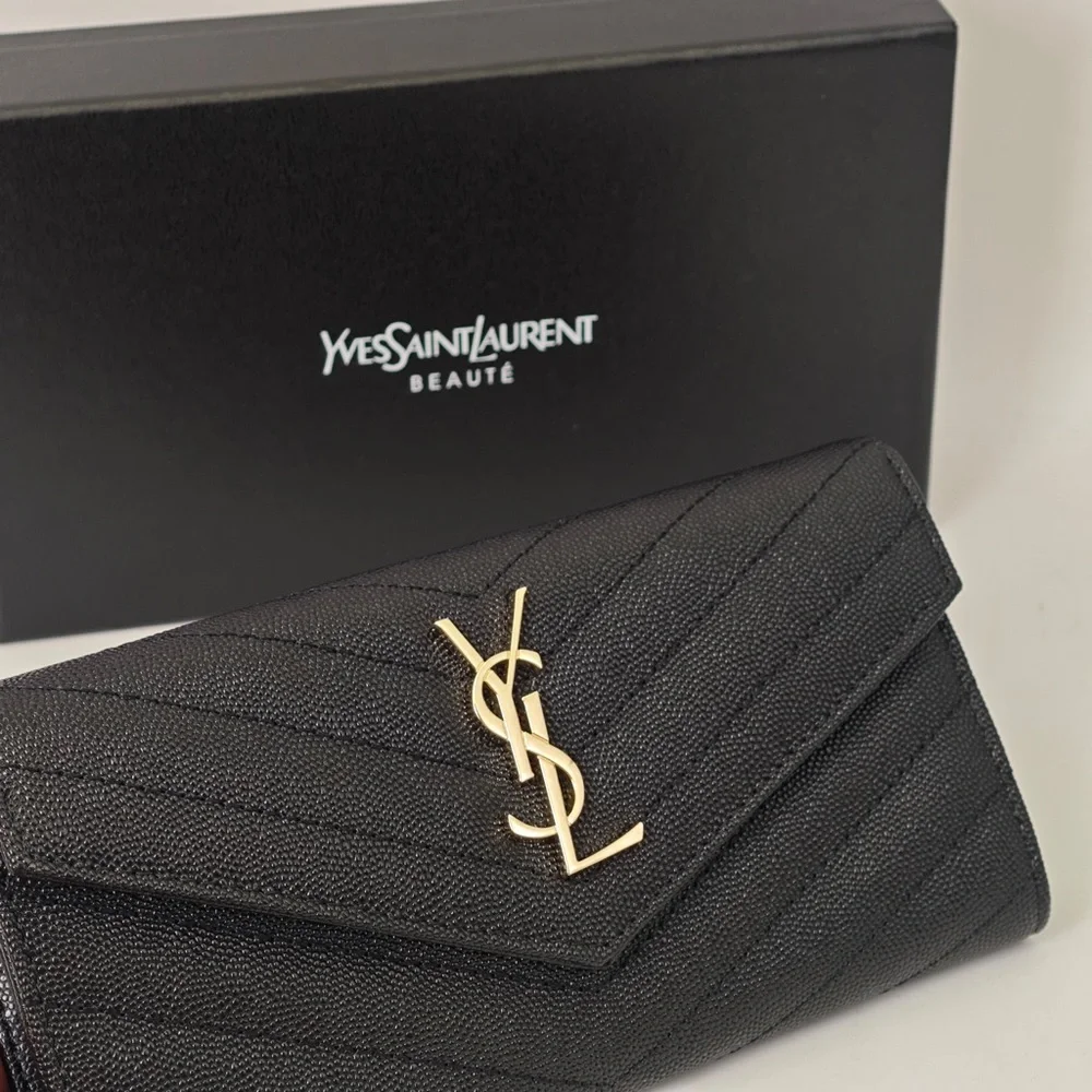 Yves Saint Laurent Quilted Black Clutch with Gold Accent